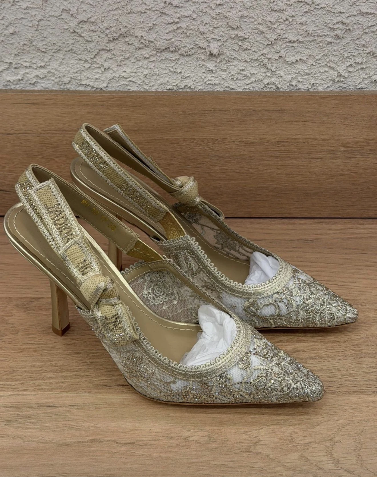 CD gold slinback